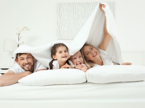 family in bed - Propane & Heating Oil Products page image