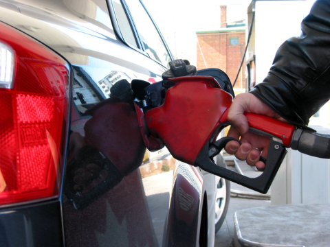filling up car gas tank - 24-Hour Gas Station Fueling Services page image