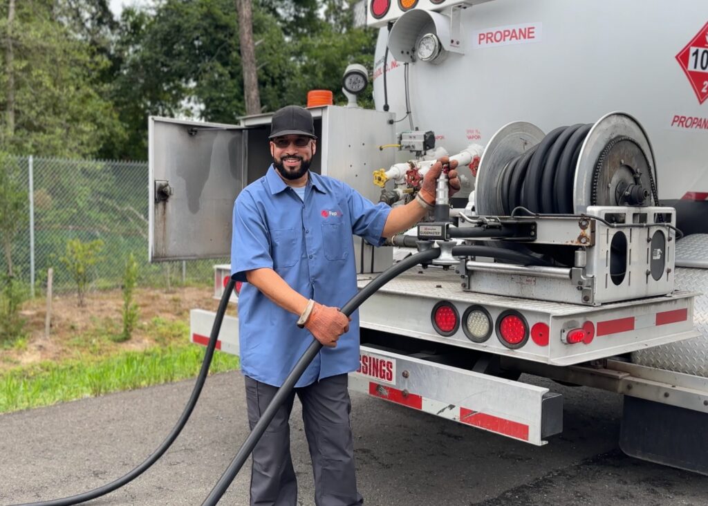 Image of Randy Pendleton, PepUp propane delivery driver, prepares to deliver propane to a PepUp customer.