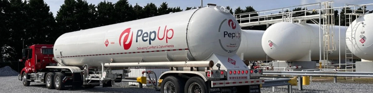 A PepUp propane fuel tanker truck refills its tank at a local storage facility before delivering up to 8,000 gallons of propane to a commercial customer.