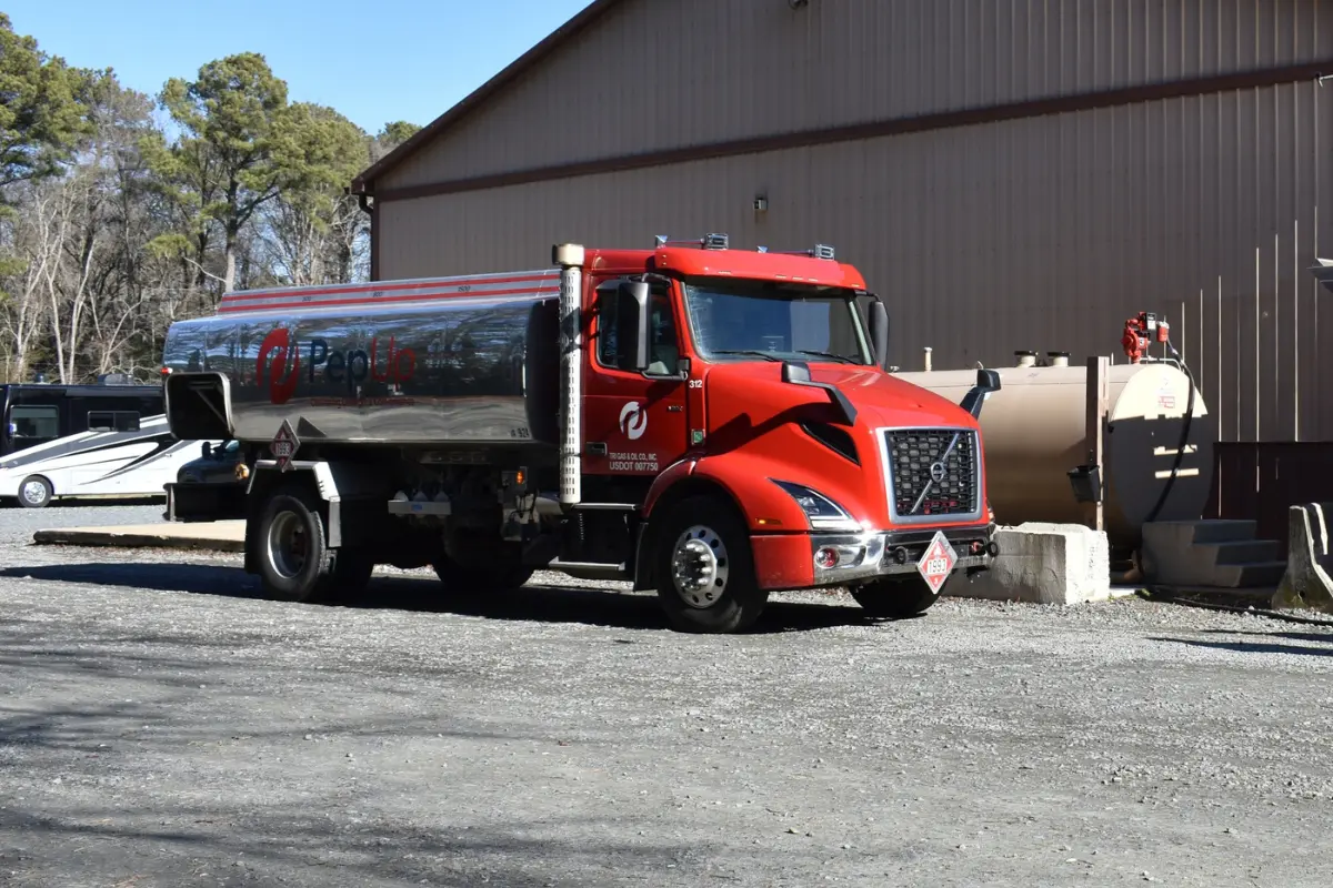 One of PepUp's smaller diesel delivery trucks fills a storage tank at a construction yard in Easton, MD.