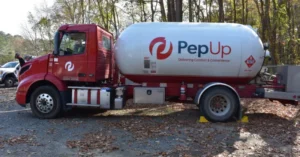 A PepUp propane delivery truck delivers pre-purchased propane in fall on Delmarva.