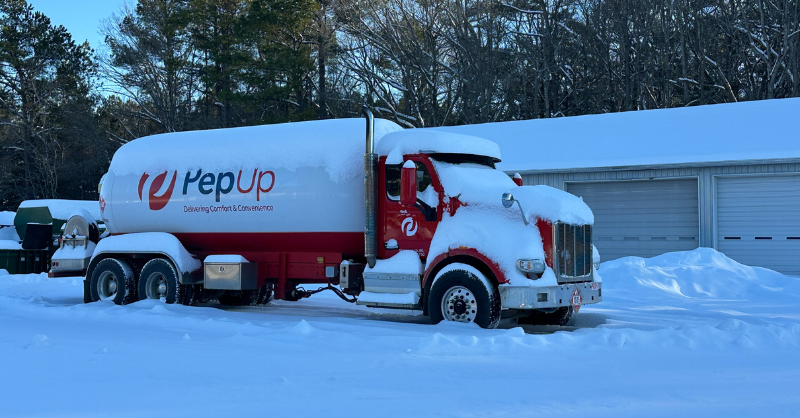 A PepUp propane delivery truck covered in snow demonstrates that propane does not freeze at Delmarva winter temperatures.